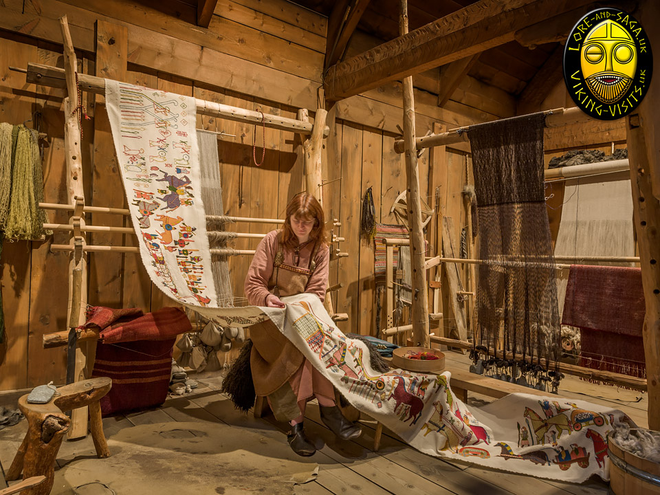 Debs working on an embroidered tapestry at Lofotr Viking Museum - Image copyrighted © Gary Waidson. All rights reserved.